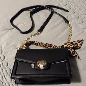 Chic Black Crossbody Bag with Gold Chain and Leopard Scarf